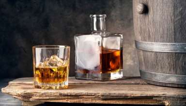 Whiskey on wooden table