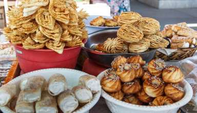 Traditional Uzbek sweets on display in a market