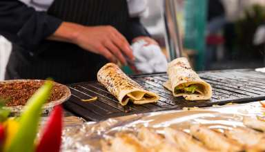 Cooking salmon kebab Turkish bazaar in Istanbul - Istanbul food and drink guide