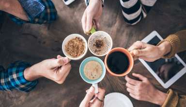A group of friends enjoying different types of coffee