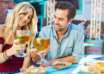 A couple enjoying food & drink