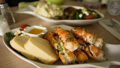 Langoustines with bread in a fish-shaped bowl